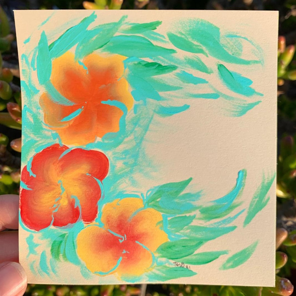 nature painting done in acrylic paint on pale cream paper. the subject matter is three hibiscus flowers in yellow, orange & red gradient one stroke flowers with bright sea green & blue leaves circling around them in a crescent moon shape. the leaves are abstract and sort of resemble ocean sea waves